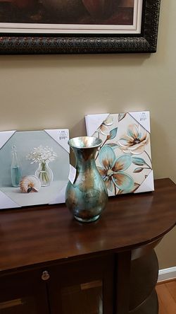 Pictures,vase and rug