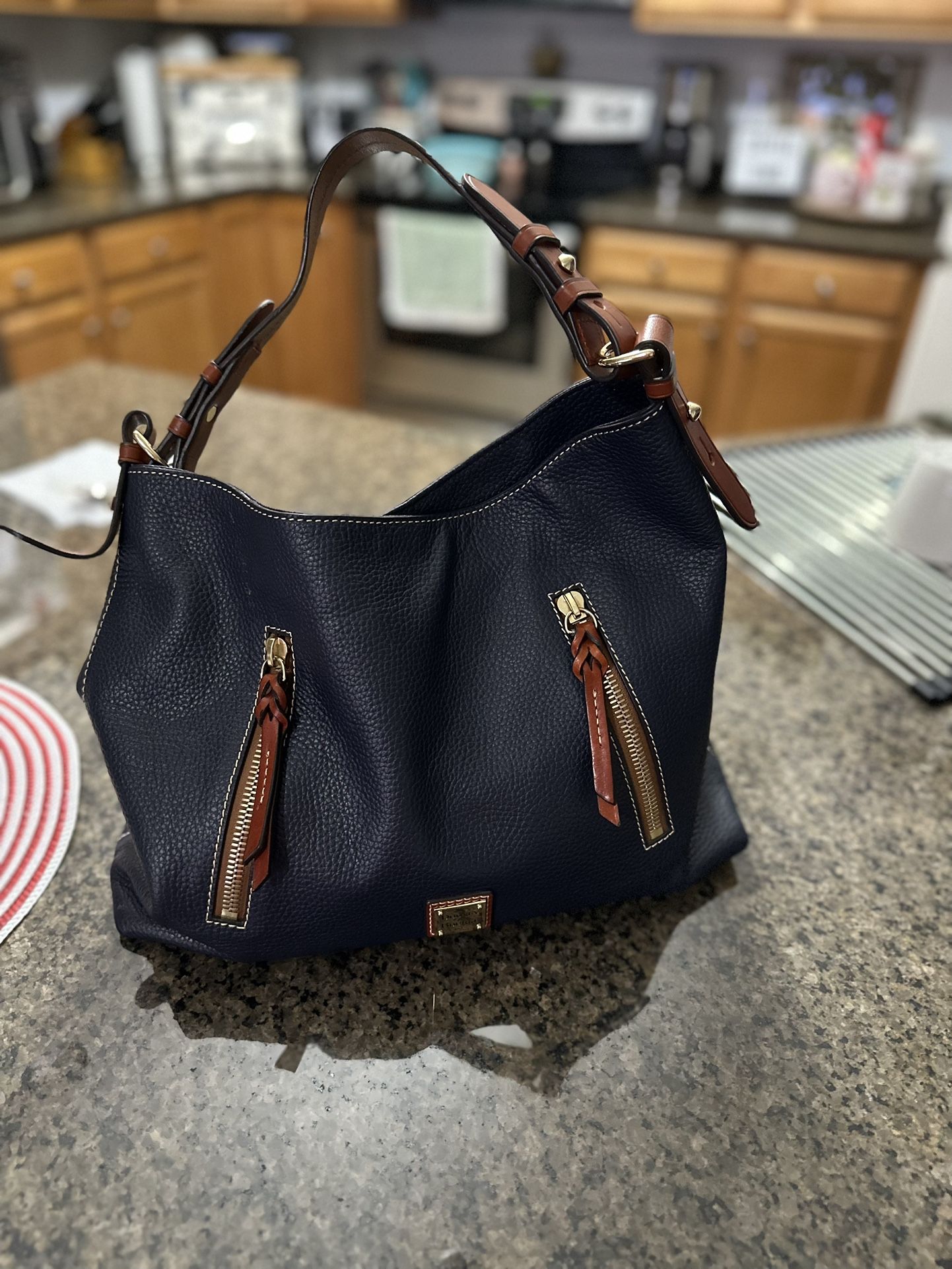 Dooney And Bourke Blue Leather Handbag
