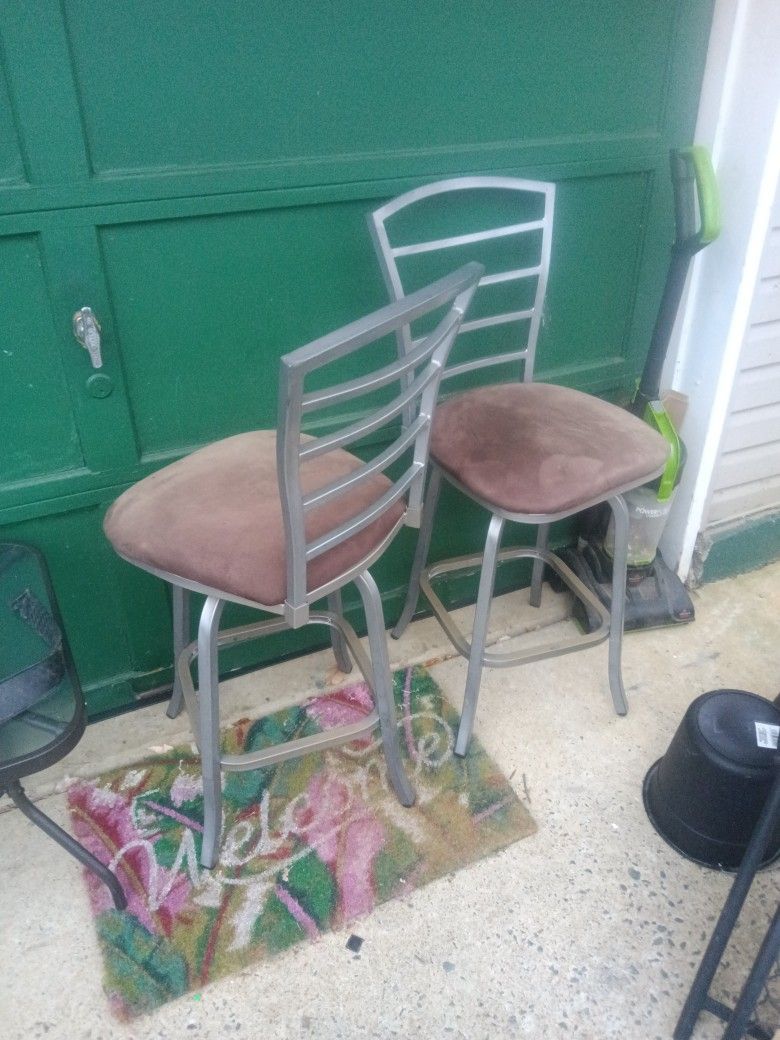 Two Bar Stools 24 Inches From The Floor To The Top Of The Seat