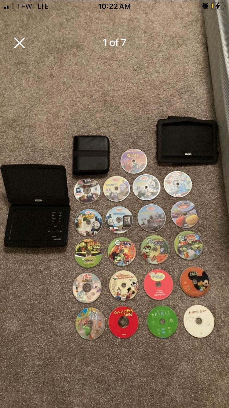 Genlty Used Surpin Portable DVD Player, With Case Protector and Cd Case W/ 21 Kids Dvds!!