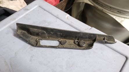 240SX S13 OEM passenger side headlight backing plastic trim