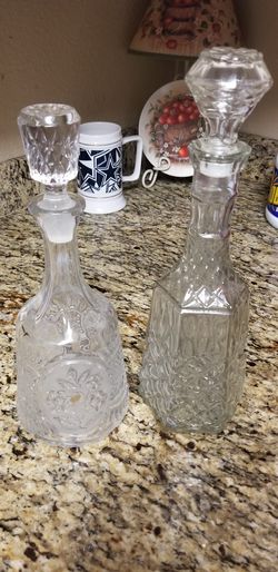 Two liquor crystal bottles