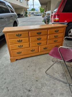 Big dresser for Twenty dollars need to be fixed