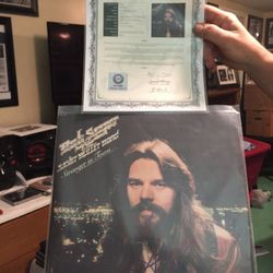 Stranger in Town by Bob Seger and the Silver Bullet Band autograph by Bob Seger with COA!
