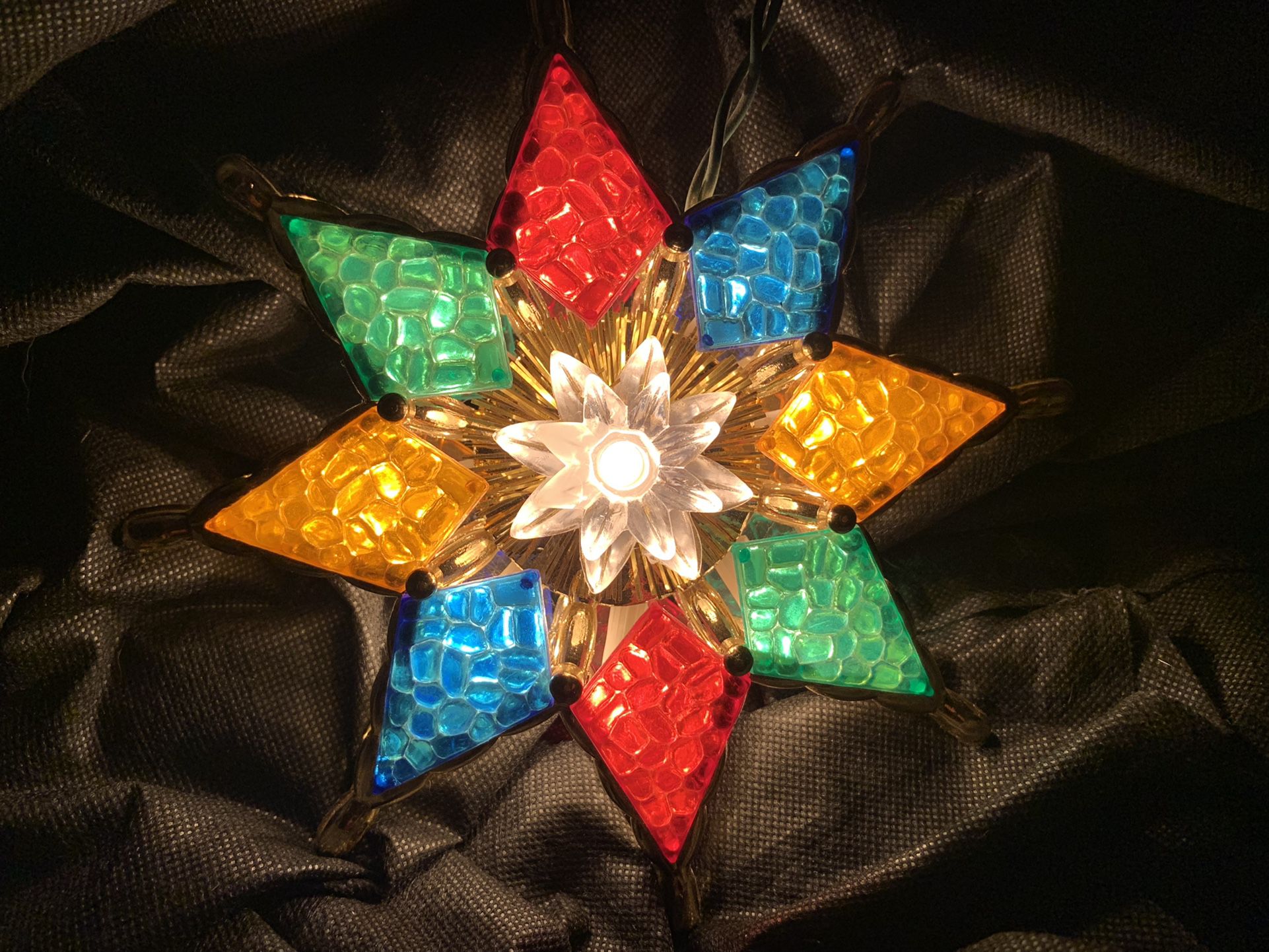  Lighted 8 Point Star Christmas Tree Topper Stained Glass Look Multi Color. Brand new, never used. Box has been misplaced. 8 Inches.