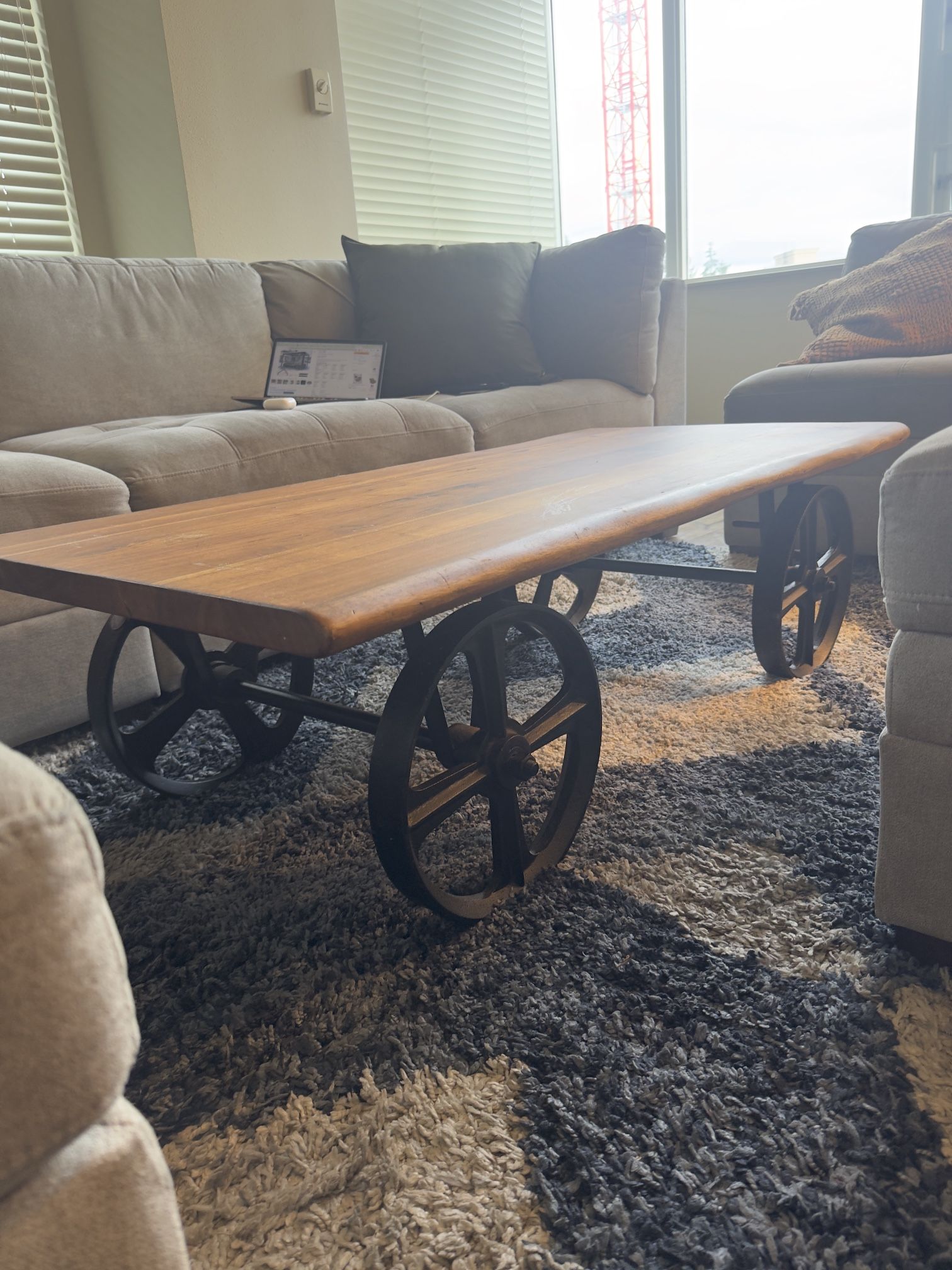 Solid Wood Coffee Table With Heavy Metal Wheels – Industrial Artisan Piece