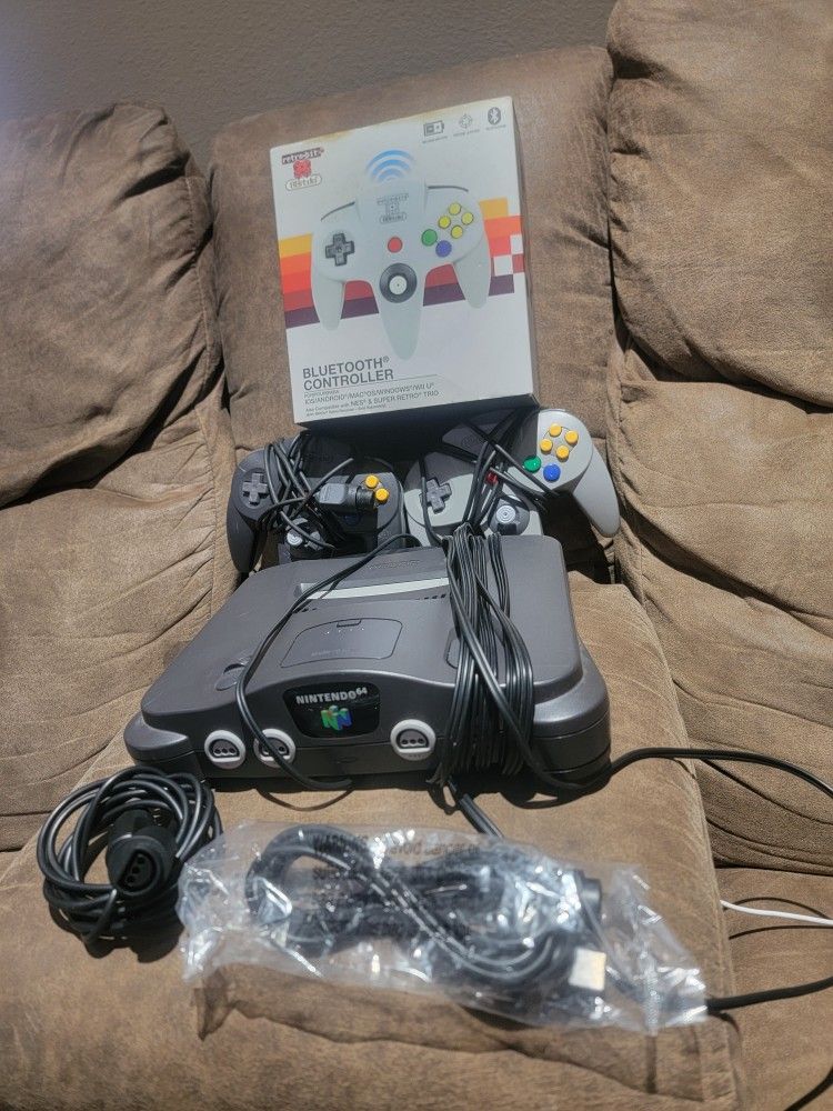 Nintendo 64 Console and Three Controllers
