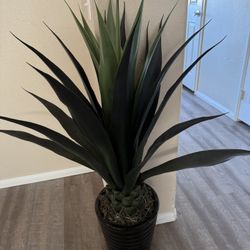 Faux Plant In Glass Pot