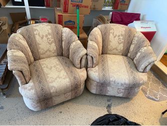 2 Swivel Accent Chairs