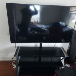 Sony 65 Inch Tv With TV Stand.