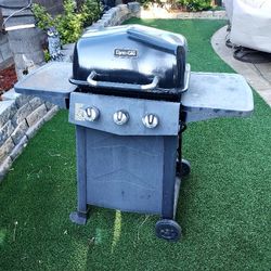 Dyna-Glo 3-burner propane gas grill in black. Only 1 year old and in good condition. $70