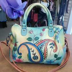 Lots of designer anuschka, wallet, cell ph holder $200