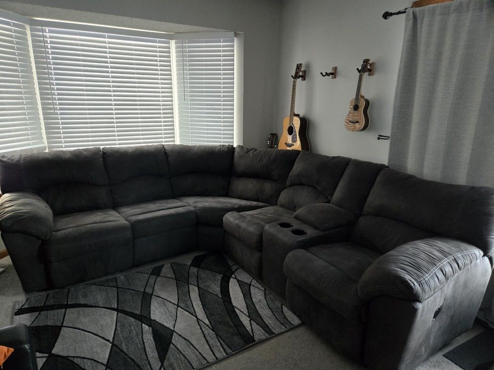 Ashley Tambo 2-Piece Manual Reclining Curved Sectional in Gray