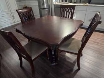 Wooden table with 4 chairs
