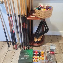 Pool Cues and 5 Coca Cola"s