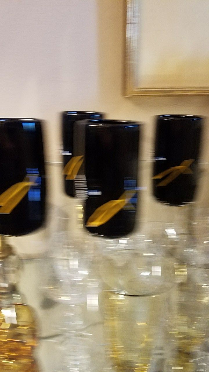 Four signed hand blown glasses