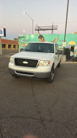 2007 Ford 4 x 4 one F150 XLT 5.4 Triton