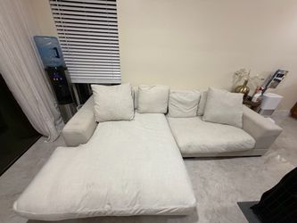 Free couch must have help and truck if it’s up it’s still available