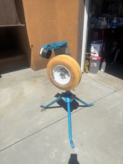 JUGS JR. fast pitch softball pitching machine.