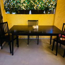 Wood black table with chairs
