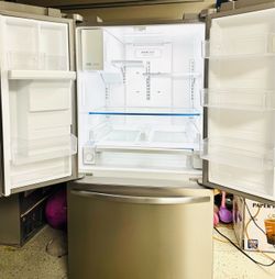 Frigidaire French-door refrigerator, September 2022. In good working condition.