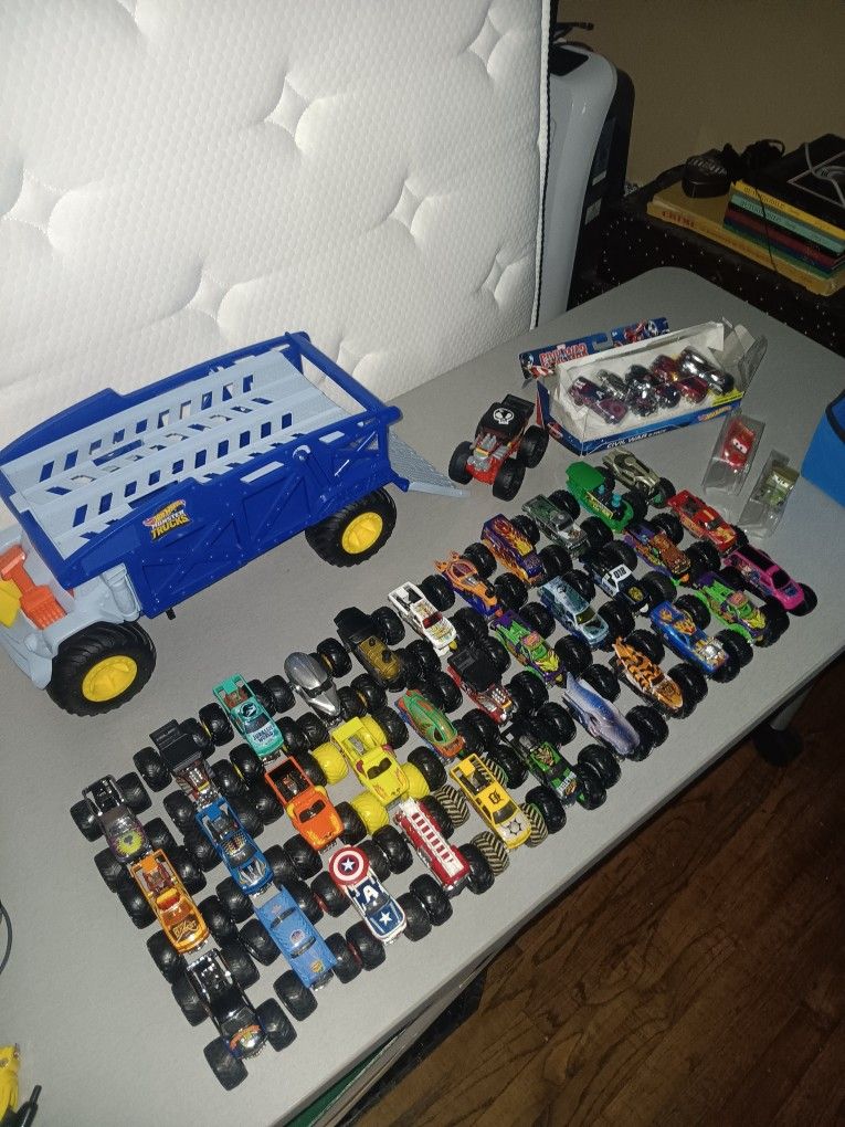 Monster Trucks (33) Plus Rhino Rig Carrier and Free Gift.