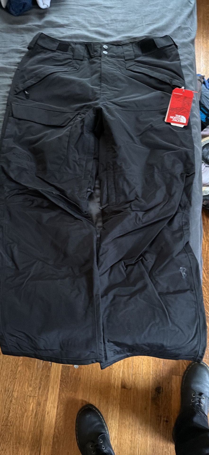 The North Face men’s large Freedom snow pants.
