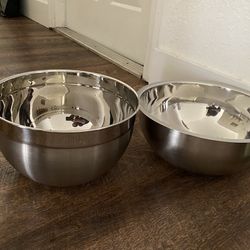 For sale 2 barely used stainless steel mixing bowls for food preparation and cooking.