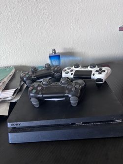 Sony PS4 Slim Console with 3 Controllers