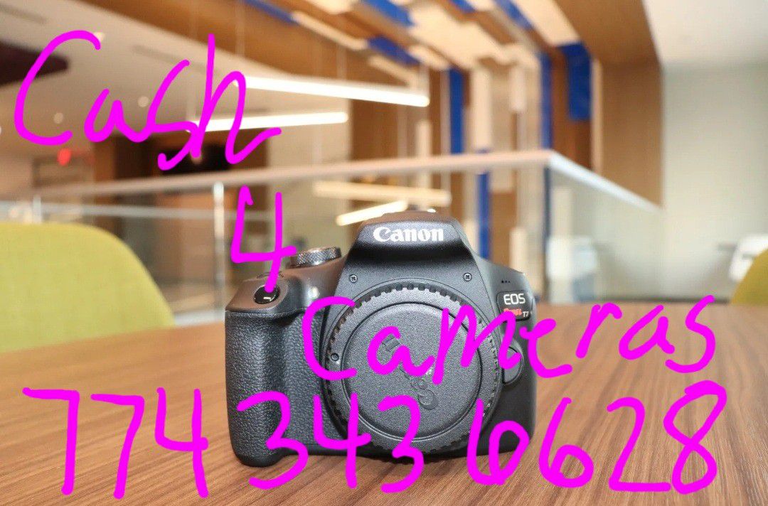 MINT Canon EOS Rebel T7
Digital SLR Camera Kit with EF-S
18-55mm (2 LENSES) 64GB