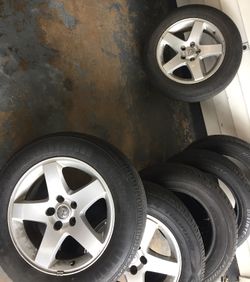 3 Dodge Challenger/Charger rims and tires and three extra tires
