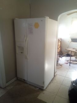 White Side-by-Side Refrigerator with Ice Dispenser