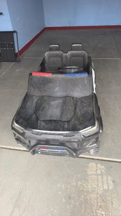 Police ride on car