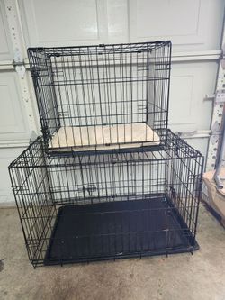 Dog crates/ 1 large, 1 small
