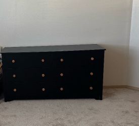 Black Wood Dresser with Gold Knobs