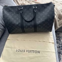 Louis Vuitton Black Duffle Bag