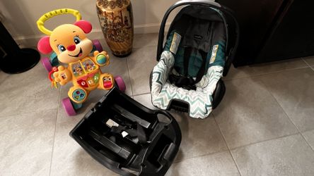 0-12 Months Car Seat, Diapers and a Free Toy