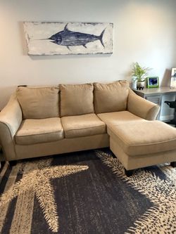 Taupe Sofa with lounge and pull out mattress