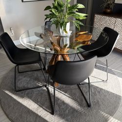 Unique Table, Chairs And Rug
