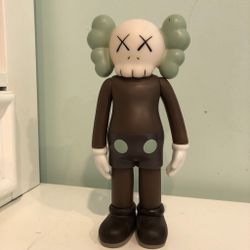 Brown and green KAWS Disney Mickey Mouse figure #MickeyMouse #KAWS