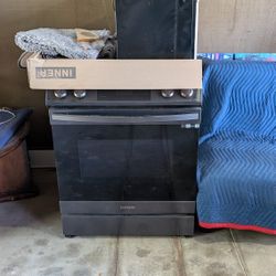 Samsung Smart Things Electric Range And  GE Microwave Vent Combo 