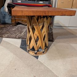 Mexican equipale side table with a leather top and cedar wood strip base.