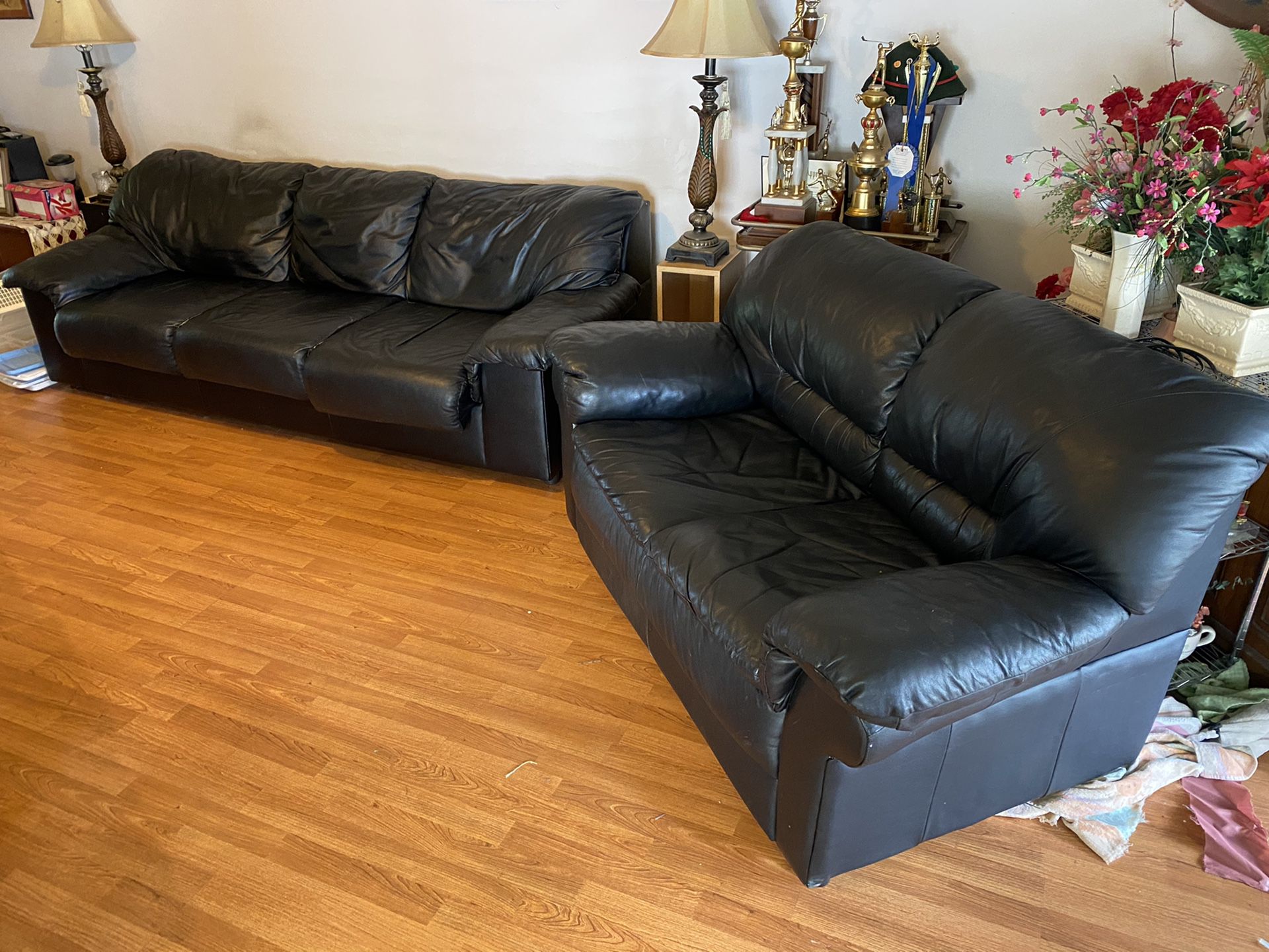 Black leather coach and love seat