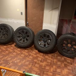 Mudders. 6 Lug 305 55 R20/ 33s On 20 Inch Rims. . Come Off Chevy Suburban . Originally Was Red. I Painted Them Black. 600.