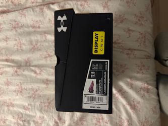 Under Armour football clears size 12.5