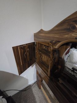 Used headboard with mirrors and doors