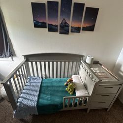 Crib, Changing Table With Drawers And A Dresser