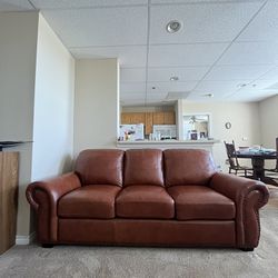 Sealy Leather Sofa With Nail Head Trim