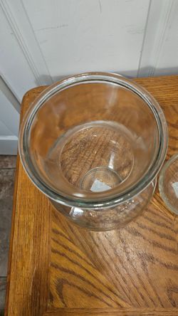GLASS FLOWER VASES 2 OF THEM