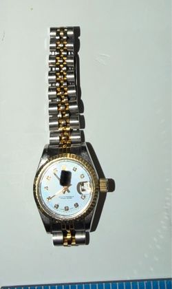 Ladies gold and silver watch